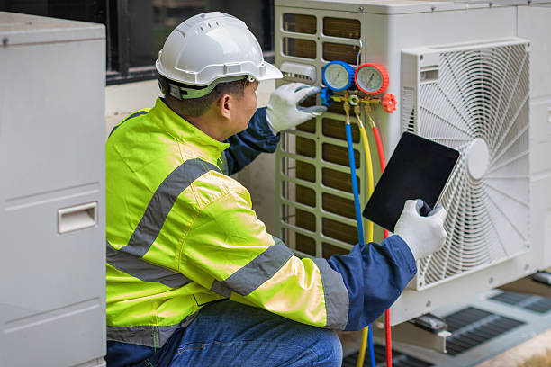 Professional Heat Pump Repair technician working in Duquesne, PA